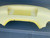 VOLKSWAGEN BEETLE 1998-2005 USED REAR BAR COVER IN YELLOW B1B PAINT CODE