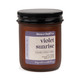 6 oz. amber glass jar candle from Slower Days Co., labeled Violet Sunrise