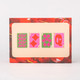 Back of storage box showing sample playing cards with colorful patterns and text