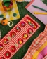 Lifestyle photo of picnic themed mancala game