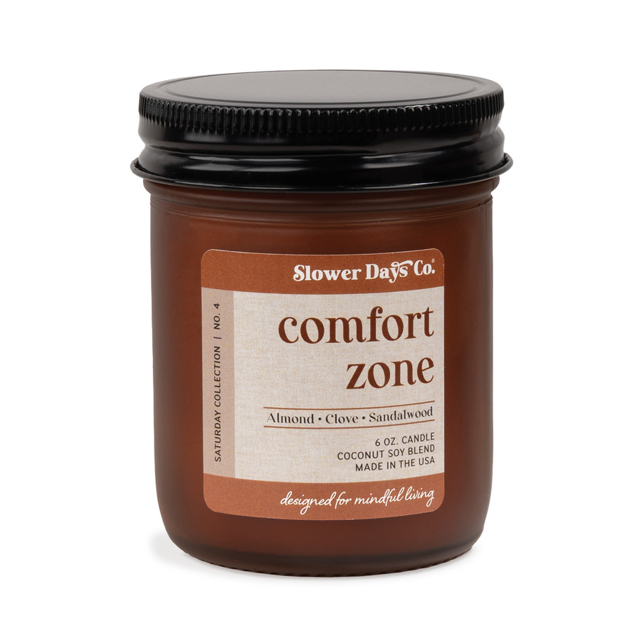 6 oz. amber glass jar candle from Slower Days Co., labeled Comfort Zone