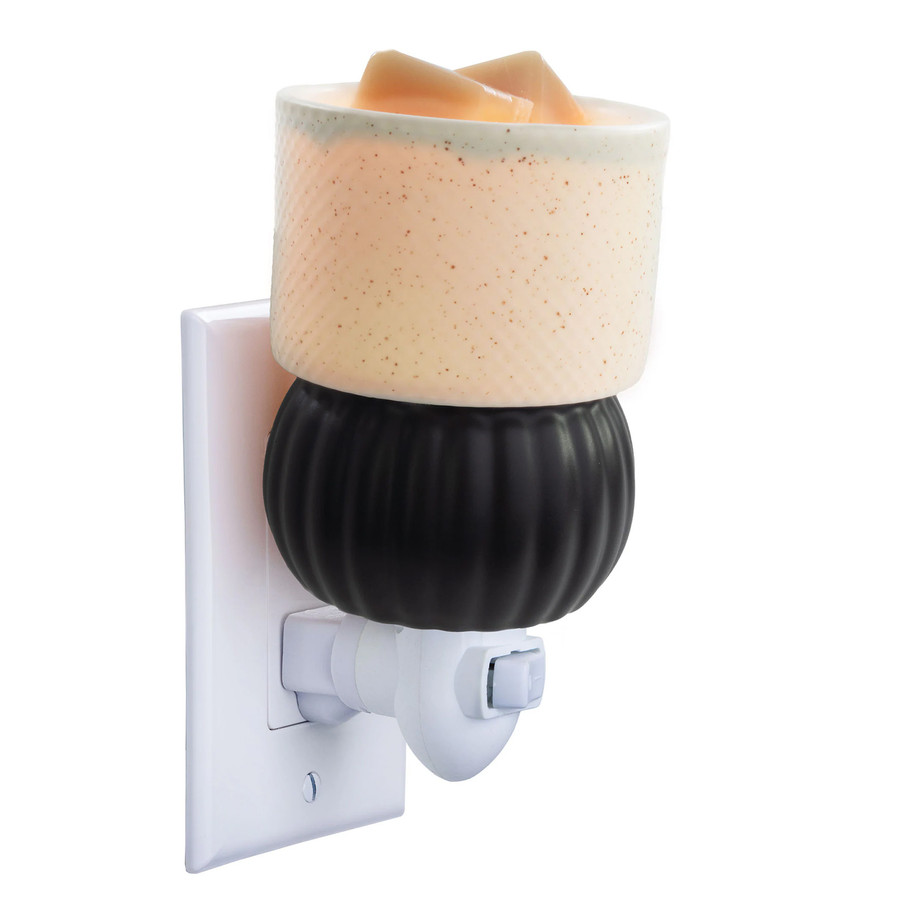 A Luxe Lamp Pluggable Fragrance Warmer featuring a matte black base and a textured white ceramic shade, shown in a vertical orientation