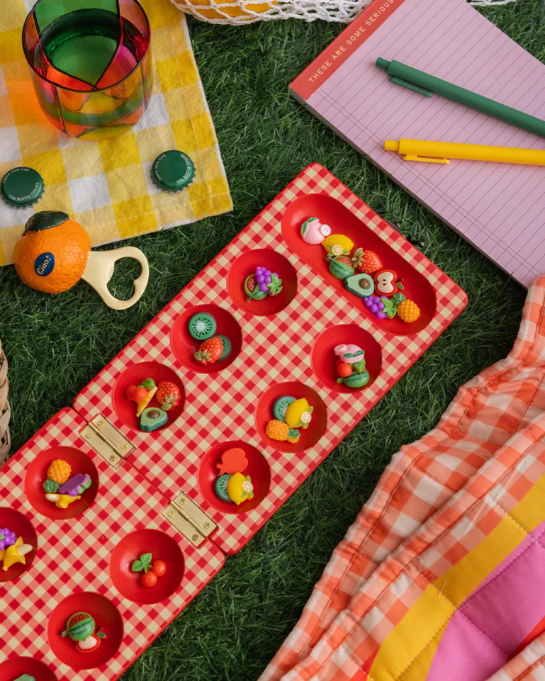 Lifestyle photo of picnic themed mancala game