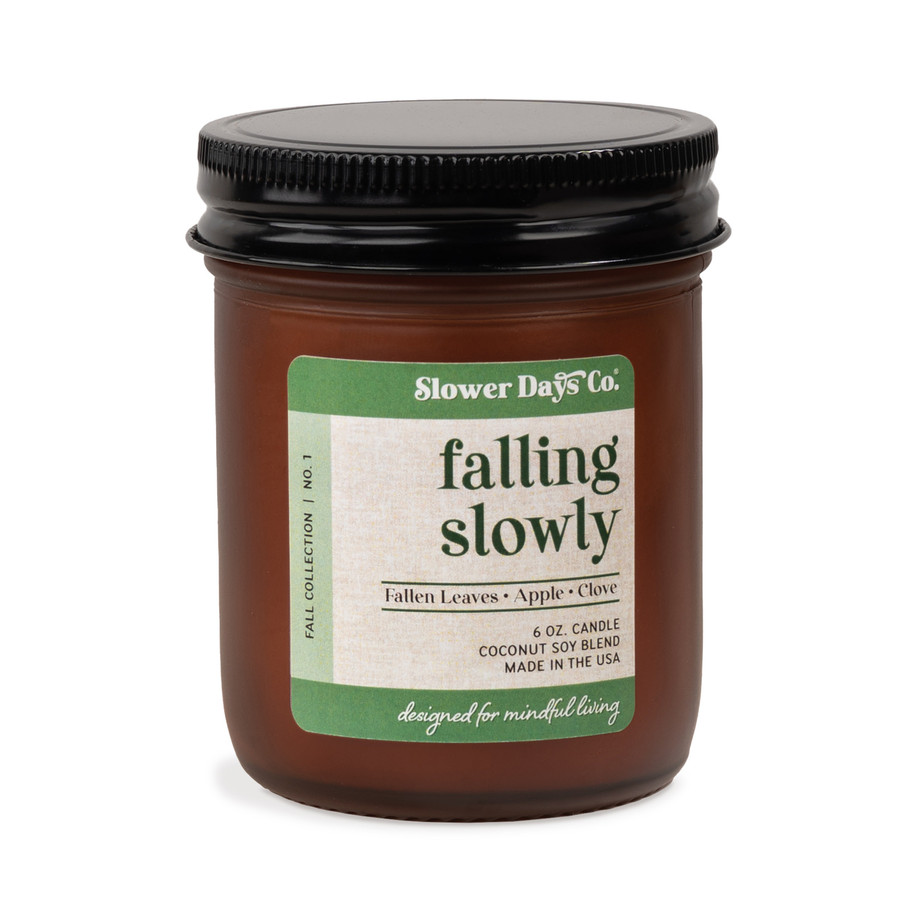 6 oz. amber glass jar candle from Slower Days Co., labeled Falling Slowly