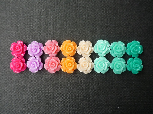 Resin flower cabochons in tropical colours