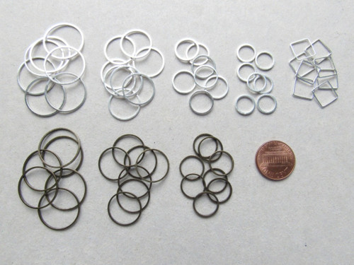 Silver or bronze linking ring connectors for jewelry making.