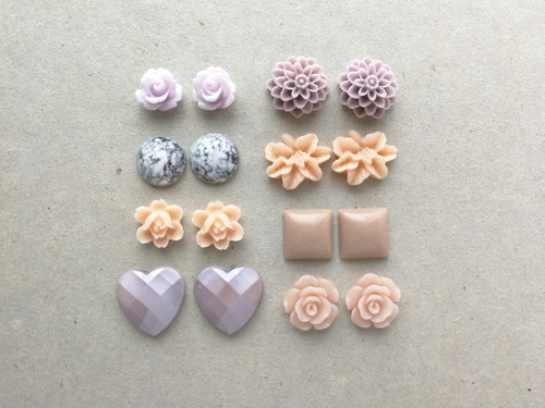 Resin flower cabochons in mauve, taupe, and peach.