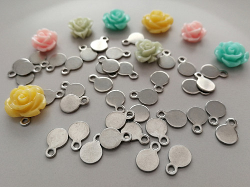 Stainless steel round metal bails and jewelry findings for crafts.