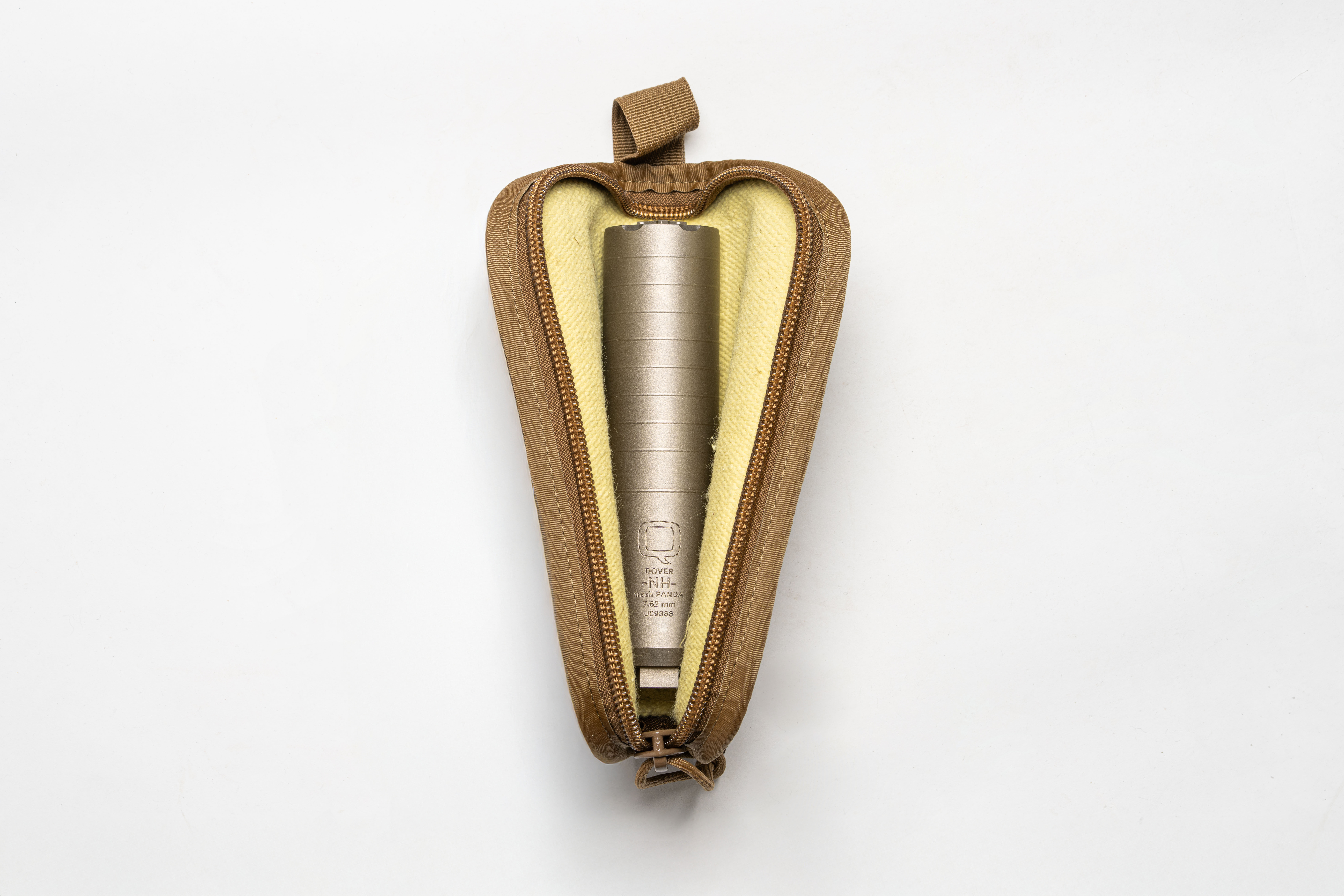 Tan silencer pouch on white background
