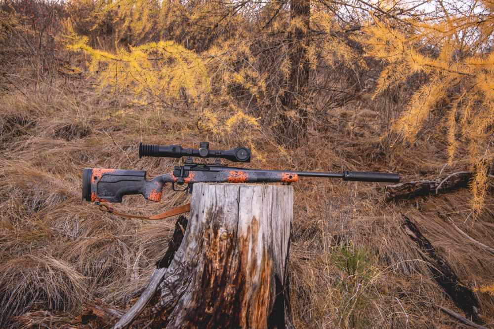 Night Stalker 4K 2.0 Weapon Mounted Scope in a field.