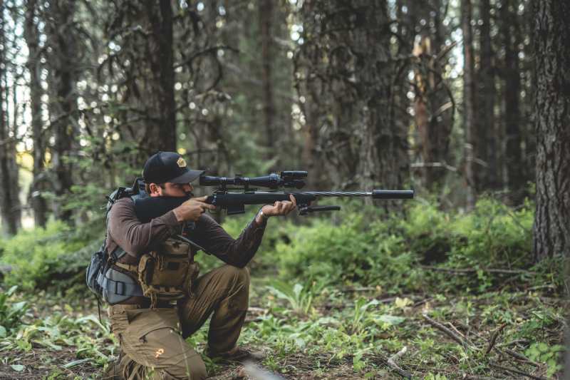 Hunter using PARD FD1 Night Vision Front Clip-on in the field.