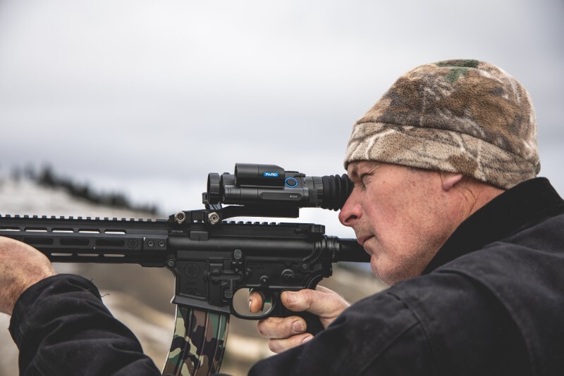 Mounted  Close-up of PARD NV008SP2/LRF showing control knobs and PIP display. Side profile of PARD NV008SP2/LRF highlighting 6.5–13x magnification lens. Rear view of PARD NV008SP2/LRF displaying OLED screen and ergonomic grip. Rear view of PARD NV008SP2/LRF displaying OLED screen and ergonomic grip. Side profile of PARD NV008SP2/LRF highlighting 6.5–13x magnification lens. NV008SP2 Night Vision Rifle Scope in the field.