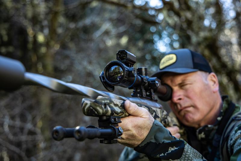 Front perspective of PARD thermal optic showing main objective lens and LRF module.