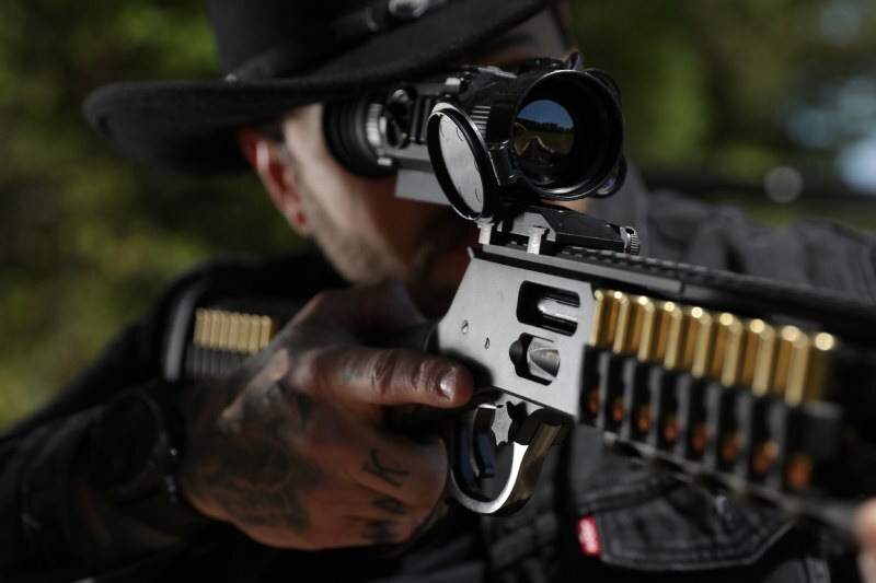 Hunter using the PARD SA32/62 LRF Thermal Imaging Scope for long-range heat detection.