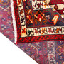 Shiraz Persian Rug 10'2" x 5'1" - Semi Antique Medallion Geometric Madder Red, Cream, Navy Blue Hand Knotted | corner detail | SKU 110022