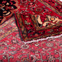 Hosseinabad Persian Rug 10'1" x 3'9" - Semi Antique Medallion Crimson, Ivory Hand Knotted | corner detail | SKU 112152