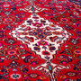 Hamadan Persian Rug 10x6 ft - Semi Antique Medallion (Toranj), Herati (Mahi) Madder Red, Ivory, Navy Blue Hand Knotted | side view | SKU 112256