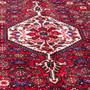 Hamadan Persian Rug 10x6 ft - Semi Antique Medallion (Toranj), Herati (Mahi) Madder Red, Cream, Navy Blue Hand Knotted | side view | SKU 112285