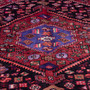 Zanjan Persian Rug 8x4 ft - Semi Antique Medallion Toranj, Herati Mahi Crimson, Navy Blue, Madder Red Hand Knotted | side view | SKU 112360