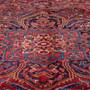 Sharabian Persian Rug 13x10 ft - Semi Antique Medallion (Toranj), Shah Abbasi Madder Red, Burgundy, Navy Blue Hand Knotted | side view | SKU 112422