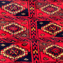 Baluch Persian Rug 5x2 ft - Semi Antique Geometric, Turkmen Gul Red, Dark Red, Navy Blue Hand Knotted | side view | SKU 112556