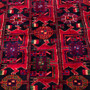 Baluch Persian Rug 8'4" x 3'3" - Semi Antique Mihrab Red, Blue Hand Knotted | side view | SKU 112573