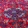 Sarouk Persian Rug 13x9 ft - Semi Antique Medallion Red, Blue Hand Knotted | side view | SKU 112609