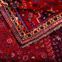 Qashqai Persian Rug 8'11" x 5'9" - Semi Antique Geometric Crimson, Blue Hand Knotted | corner detail | SKU 112717