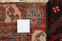 Nahavand Persian Rug 11'6" x 4'10" - Semi Antique Medallion Navy Blue, Red Hand Knotted | side view | SKU 110221