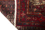 Senneh Persian Rug 10'6" x 5'3" - Semi Antique Medallion Crimson, Navy Blue Hand Knotted | side view | SKU 110331