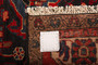 Nahavand Persian Rug 8'4" x 5'2" - Semi Antique Medallion Navy Blue, Red Hand Knotted | side view | SKU 110373