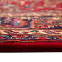 Mashhad Persian Rug 10x8 ft - Semi Antique Shah Abbasi, Medallion (Toranj) Crimson, Navy Blue, Brown Hand Knotted | side view | SKU 110598