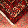 Hosseinabad Persian Rug 10x5 ft - Semi Antique Medallion Crimson, Ivory Hand Knotted | corner detail | SKU 110002