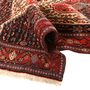 Senneh Persian Rug 9'11" x 4'4" - Semi Antique Medallion Crimson, Navy Blue Hand Knotted | detail view | SKU 111084