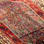 Senneh Persian Rug 9'11" x 4'4" - Semi Antique Medallion Crimson, Navy Blue Hand Knotted | back view | SKU 111084