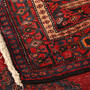 Senneh Persian Rug 8'5" x 3'9" - Semi Antique Medallion Crimson, Navy Blue Hand Knotted | corner detail | SKU 111087
