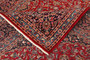 Mashhad Persian Rug 12x9 ft - Semi Antique Eslimi Medallion Madder Red Navy Blue Cream Hand Knotted | side view | SKU 111221