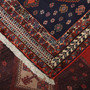Sirjan Persian Rug 8'4" x 5'7" - Semi Antique Medallion Red, Navy Blue Hand Knotted | corner detail | SKU 111320