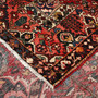 Bakhtiari Persian Rug 13x9 ft - Semi Antique Medallion Blue, Crimson Hand Knotted | corner detail | SKU 111339