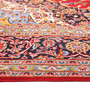 Kashan Persian Rug 13x9 ft - Semi Antique Shah Abbasi, Medallion (Toranj) Crimson, Navy Blue, Cream Hand Knotted | side view | SKU 111374