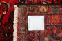 Hosseinabad Persian Rug 10'6" x 3'3" - Semi Antique Medallion Crimson, Ivory Hand Knotted | corner detail | SKU 111380