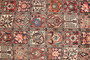 Bakhtiari Persian Rug 10x6 ft - Semi Antique Kheshti Garden, Geometric Madder Red, Crimson, Navy Blue Hand Knotted | side view | SKU 111447
