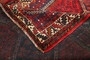 Shiraz Persian Rug 8'8" x 5'7" - Semi Antique Geometric Blue, Red Hand Knotted | side view | SKU 111564