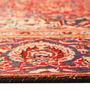 Mashhad Persian Rug 12x9 ft - Semi Antique Medallion Toranj, Shah Abbasi Madder Red, Crimson, Navy Blue Hand Knotted | side view | SKU 111637