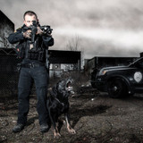 Streamlight ProTac Rail Mount 2 Long Gun Light, Shown on a Weapon Held by a Police Officer