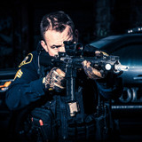 Streamlight ProTac Rail Mount 2 Long Gun Light, Shown with Officer Focused on Subject