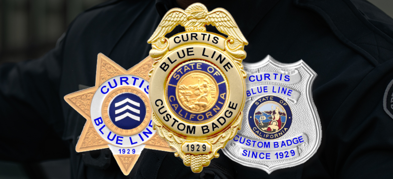 3 custom police badges in different finishes and shapes.