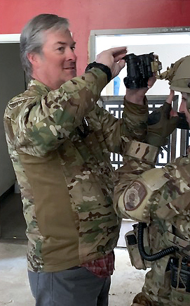 Curtis Blue Line Tactical Product Specialist showcasing a tactical camera.