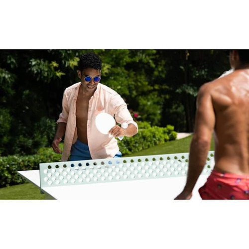Ledge Lounger Table Tennis-Black Table-White Net-White Paddle-Black Accent