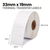 Roll of white 33mm x 19mm thermal transfer labels on a 25mm core, 1000 labels per roll
